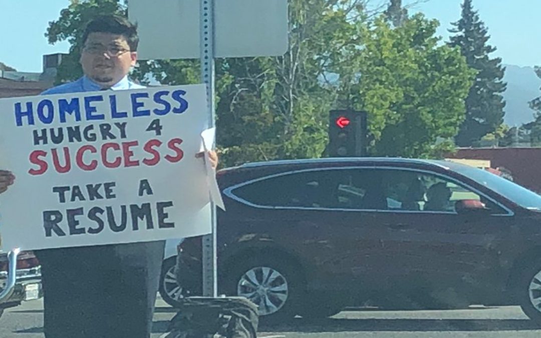 Picture of homeless Mountain View web developer goes viral after he’s shown offering resume, not asking for donations